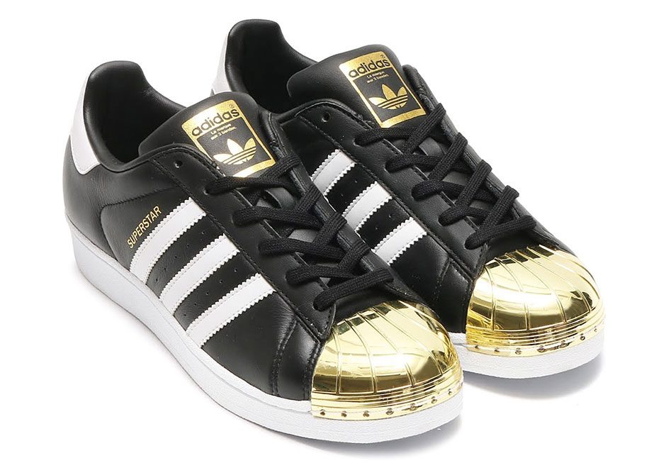 gold adidas shell toes