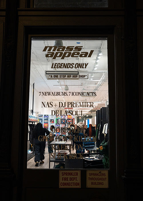 Mass Appeal proudly announces the opening of Legends Only: The Pop Up Experience, a groundbreaking one-stop hip hop shop experience. Designed as a one-of-a-kind cultural destination, Legends Only: The Pop Up Experience celebrates the legacy, influence, and continued impact of hip-hop’s most iconic artists.
This must-attend event introduces fans to a fully immersive space, where every element and detail is designed to heighten the fan experience and bring hip-hop history to life in real time. These elements include and feature stand-alone sections dedicated to each Legend, complete with exclusive merchandise available only at the Legends Only location. As guests explore each section, they will also experience live DJ Sessions, live podcast tapings, celebrity meet and greets, and rare artifacts including the “Cabin” from De La Soul’s Cabin In The Sky, a throne Slick Rick has only ever sat in once and more.
Legends Only & Legends Only: Pop Up Experience are spearheaded by Mass Appeal’s historic Legend Has It… series—an ambitious, year-long celebration spotlighting some of the most influential artists in hip-hop history. The series delivered landmark releases from Slick Rick, Raekwon, Ghostface Killah, Mobb Deep, Big L, De La Soul and on 12.12.25 the release of the long-awaited collaborative album from Nas and DJ Premier Light-Years.
The Legends Only Event and Pop Up Experience serves as the end-of-year finale to one of the best promotional campaigns by a label in recent memory. Not only is it a fitting celebration of the label's historic run, but also a thank you to the fans and culture the Legend Has It series was designed for.
Legends Only: The Pop Up Experience is located on 47 Howard Street, NY, NY 10013 and is open daily from noon to 7 pm.
You can peruse this slideshow of downloadable pictures, which include Nas, De La Soul, Rapsody, Rome Streetz and more, displaying the space and a few of the stand-alone sections.