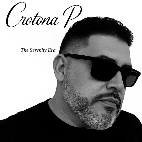 Black-and-white portrait of Crotona P wearing sunglasses during his Spit Fire Radio interview discussing his album Serenity and artistic growth