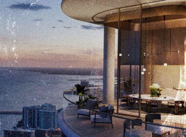 Rapper in a high-rise studio overlooking city lights at night while MPC pads glow nearby — cinematic Hip-Hop elevation theme inspired by Araab Muzik production.