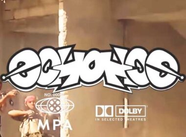 Hip-Hop artist standing in a corner store chips aisle filming a music video scene — gritty urban visual for Echo’s “Jihad” from EchoisthenameTV Season 16.