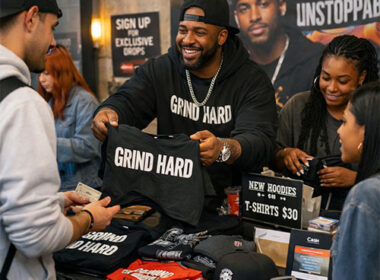 Independent Hip-Hop artist selling merchandise directly to fans, representing the rise of the direct-to-fan economy in modern rap