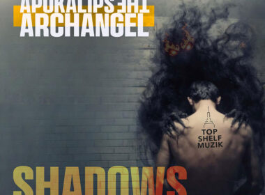 Cover art for “Shadows” by Apokalips The Archangel featuring a shadowy smoke figure with glowing eyes looming behind a man standing against a dark wall with bold gold and white typography.