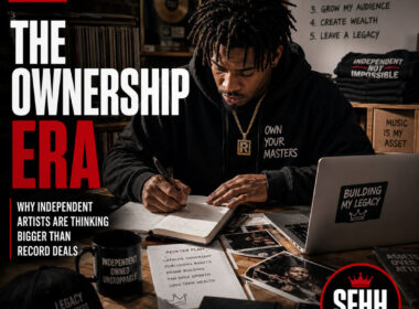 An independent artist sitting alone in a creative workspace reviewing contracts, notebooks, merchandise designs, and music release plans. Clean editorial composition, natural lighting, premium magazine feel, minimal typography, official SpitFireHipHop logo top-left, SFHH editorial badge bottom-right.