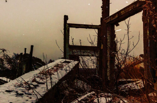 Cover art for Benny Slumz and Skinny Bonez Tha Godfatha's single "Picture Dat," featuring a desolate snow-covered ruin that reflects the song's cinematic and melancholic atmosphere.