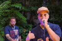 E Reece performs "The Process" and "So Beautiful" live while producer Mr. Sonny James DJs during an outdoor performance in Los Angeles, California.