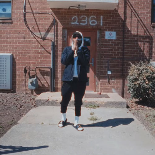 Superior and Let The Dirt Say Amen stand at the entrance of a brick apartment building in the official video for "Hopeful Studies," the lead single from their upcoming collaborative album The Saint, The Servant, The Sinner.