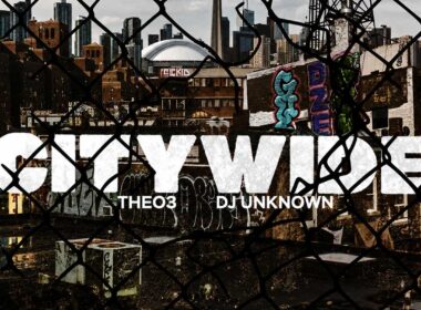 Theo3 and producer DJ Unknown's Citywide single artwork featuring an urban skyline framed by graffiti and chain-link fencing.