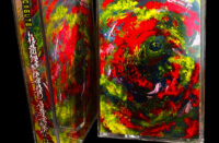 Boxguts x DJ Akoza Metal Head Space cassette artwork featuring vivid red, yellow, green and black abstract imagery for the single “Subterranean.”