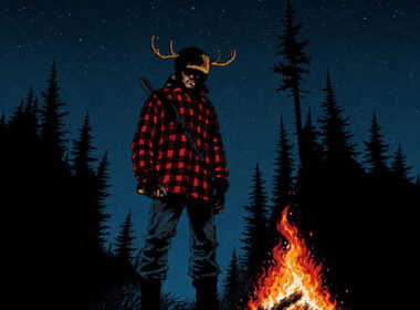 Trial By Fire single cover featuring a hunter wearing red plaid beside a campfire in a dark Canadian forest