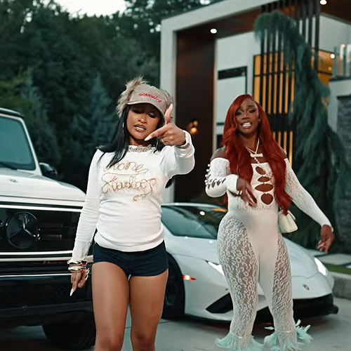 Young Lyric and Claressa Shields appear in the “Can’t FWM” music video in front of luxury vehicles and a modern home.